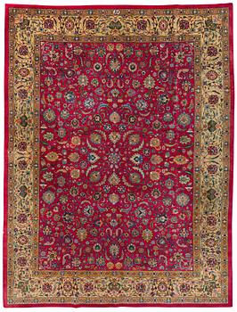 A CARPET, A semi-antique Tabriz, ca 374 x 283 cm.