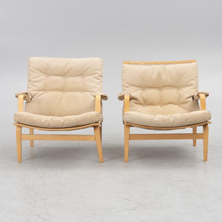 Bruno Mathsson, a pair of 'Ingrid' armchairs, Dux.