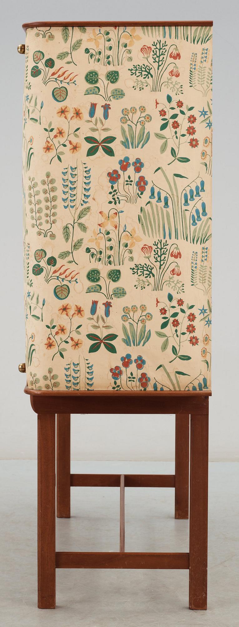 A Josef Frank mahogany cabinet, doors and sides covered in Frank's floral chintz fabric 'Fatima', Svenskt Tenn ca 1937.