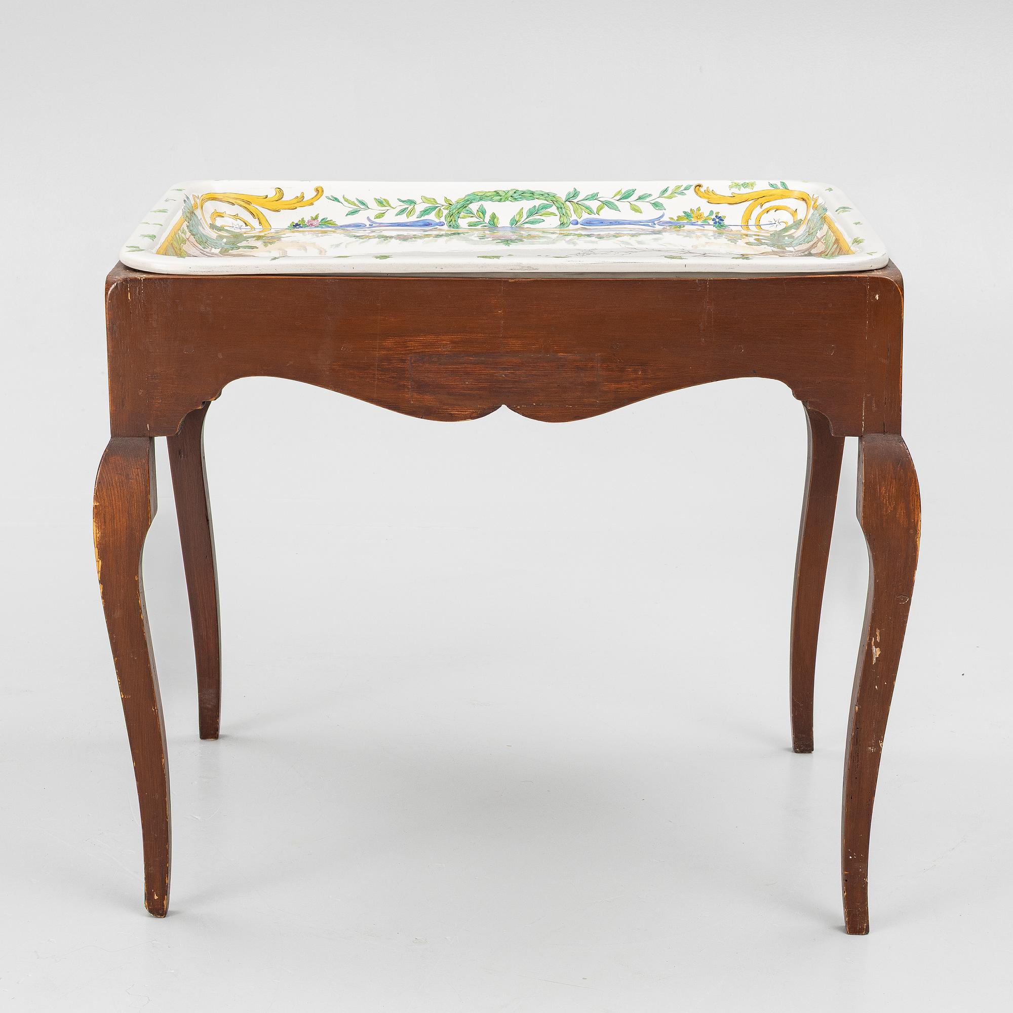 A Swedish rococo tea table with an associated top, 18th and 20th century.