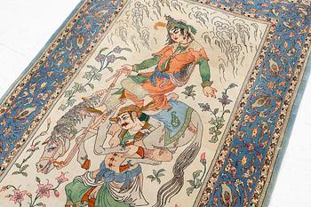 An Isfahan, figural rug, signed, c. 172 x 109 cm.