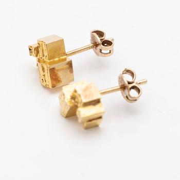 A pair of 18K gold earrings.