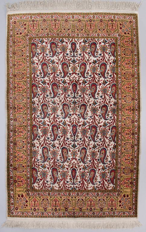 An Oriental silk rug. Circa 160x103 cm.