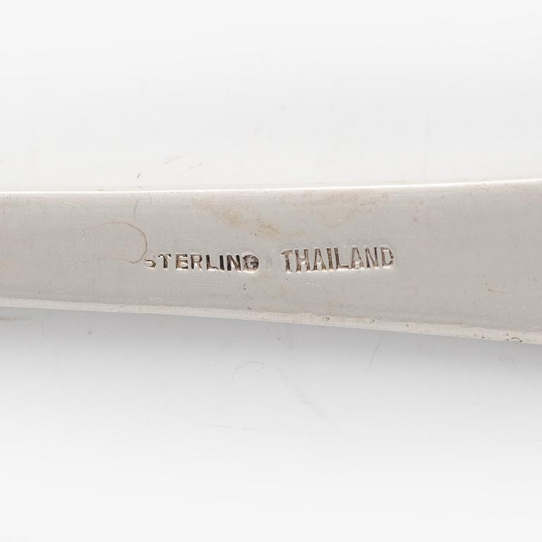 Four sterling silver servers, Thailand 20th century.
