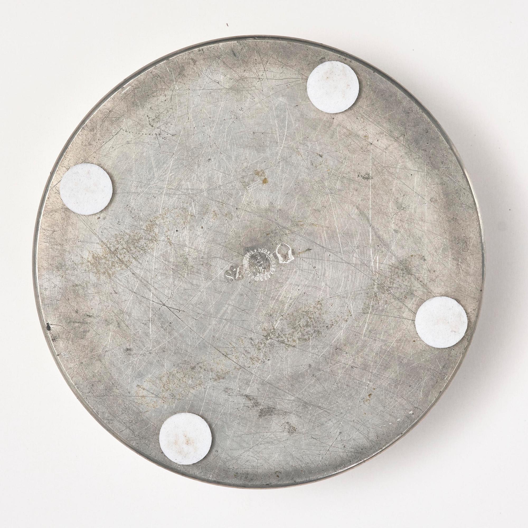 Firma Svenskt Tenn, a pewter and glass ashtray/bowl, Stockholm, 1950.