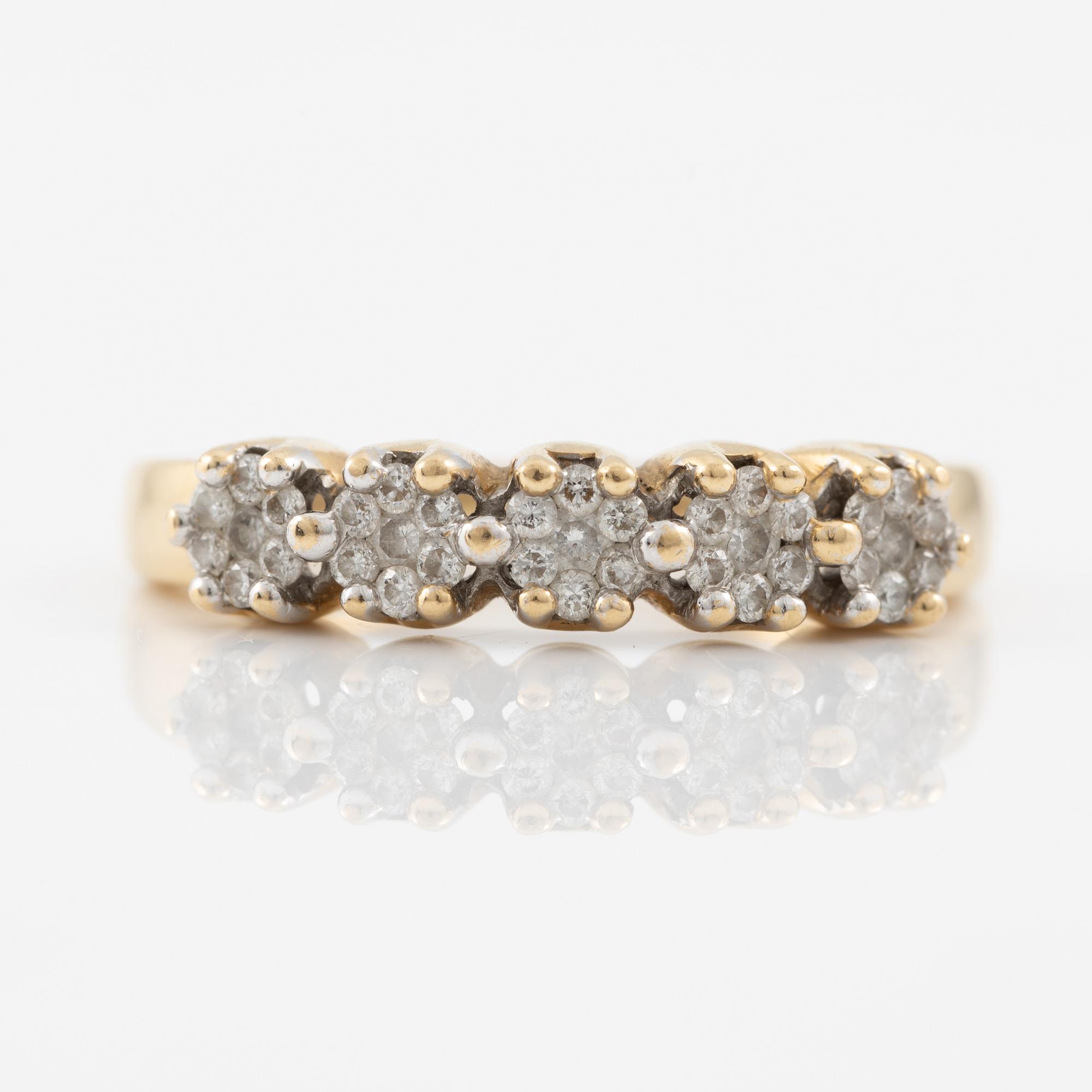 Ring in 18K gold set with small brilliant-cut diamonds.