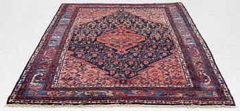 A semi-antique Ingelas carpet, c. 212 x 140 cm.