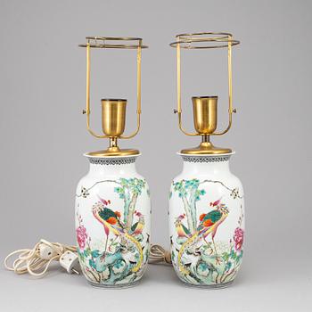 A pair of Chinese famille rose vases, turned into table lamps, 20th century.