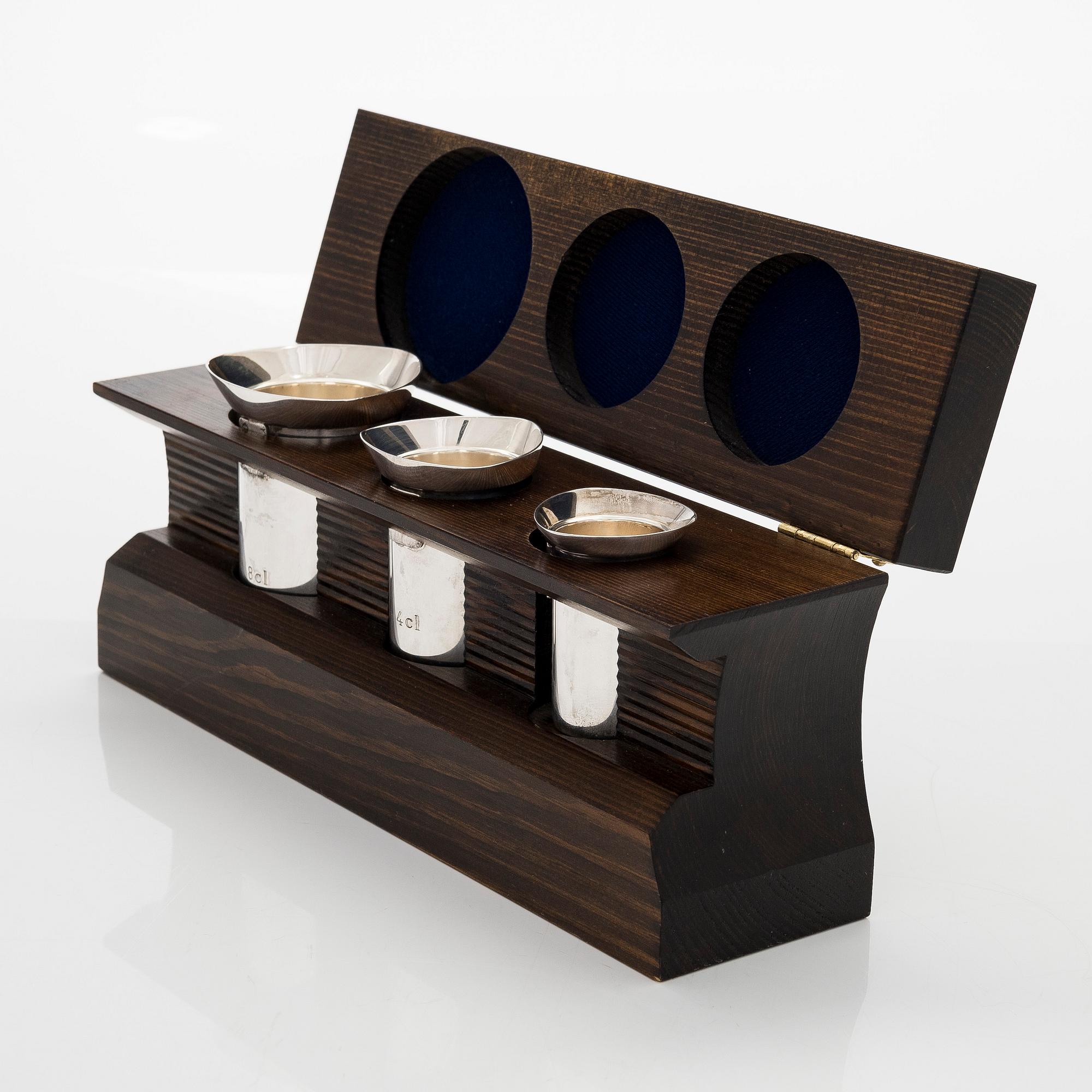 Three spirit measuring cups, silver 830, in a wooden box, Kultakeskus, Finland 1983.