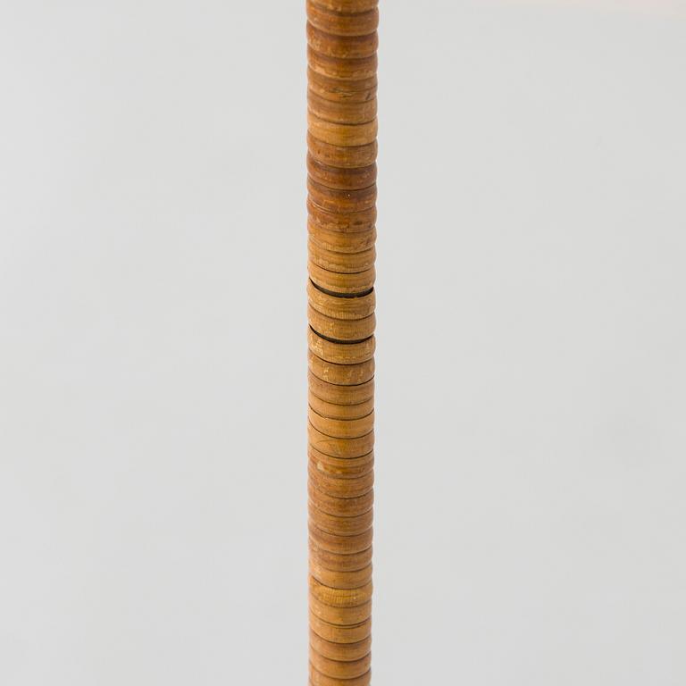Paavo Tynell, a mid-20th century K10-10 floor lamp for Taito.