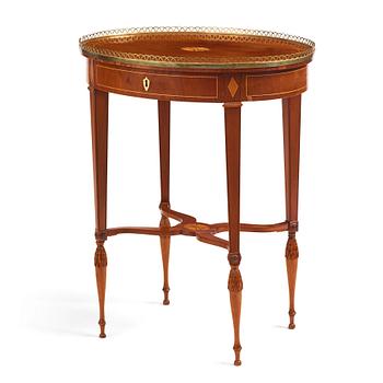 35. A late Gustavian mahogany table attributed to L. Qvarnberg (master in Stockholm 1801-1813).