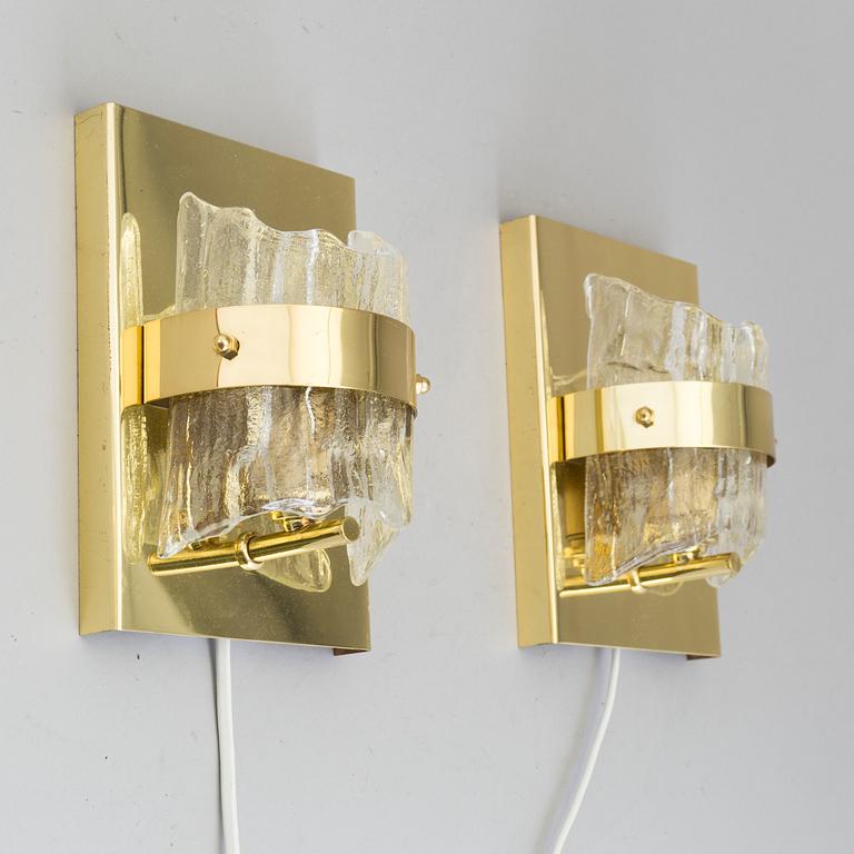 A pair of wall lights marked Fred L. Thiesen, 20th century.