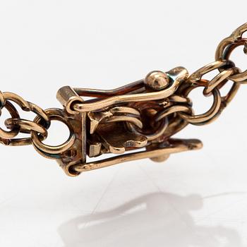 A 14K gold necklace. Aittamäki Ky, Nurmisjärvi 1992.