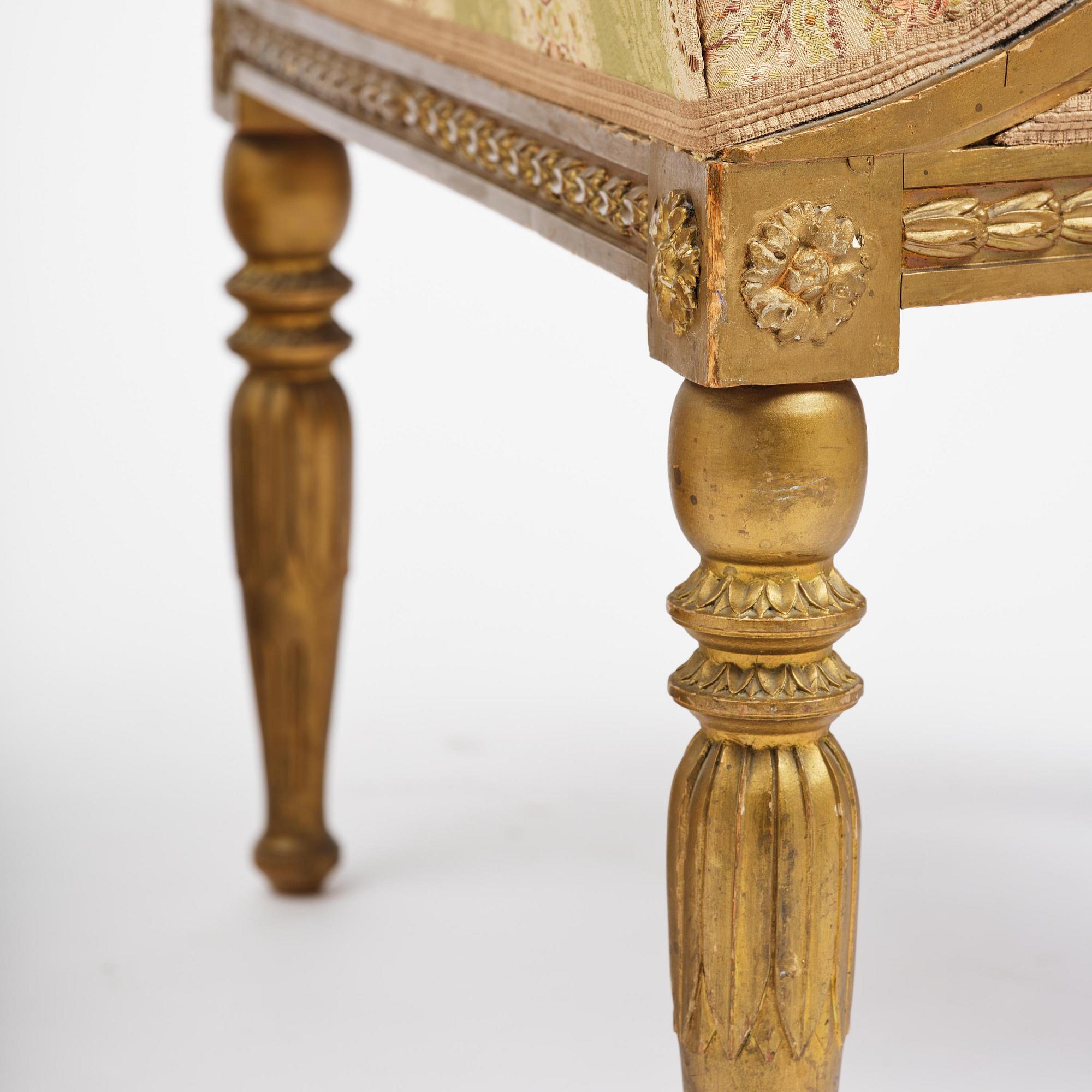 A pair of late Gustavian open armchairs attributed to E. Ståhl (master in Stockholm 1794-1820).