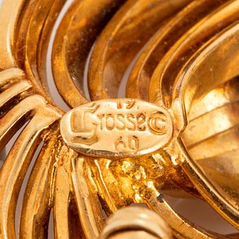 Brosch 18K guld med runda briljantslipade diamanter.