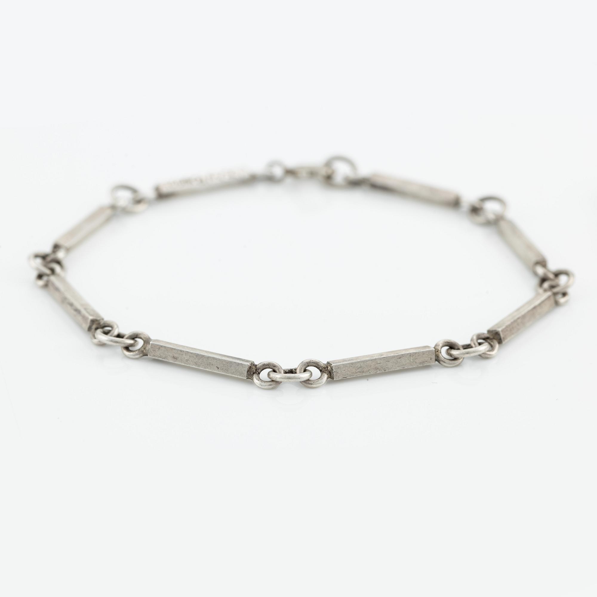 Set with necklace, bracelet, and earrings, silver.