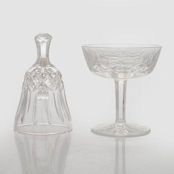 A set of 13 dessert bowls / champagne glasses, Waterford. and a table clock.