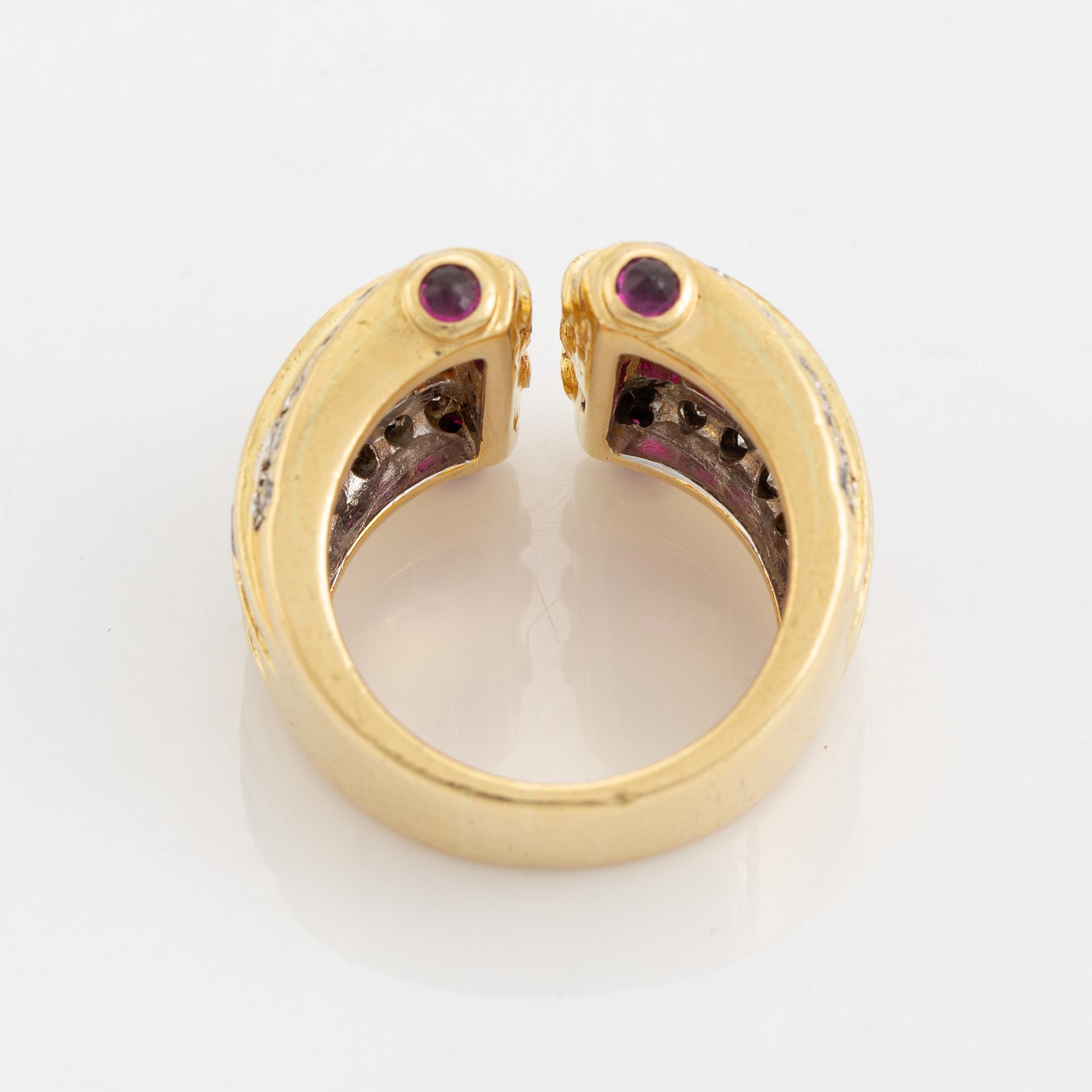 Step cut ruby and brilliant cut diamond ring.