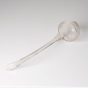 A cut glass punch bowl with cover, stand and ladle, Empire, first part of the 19th century.