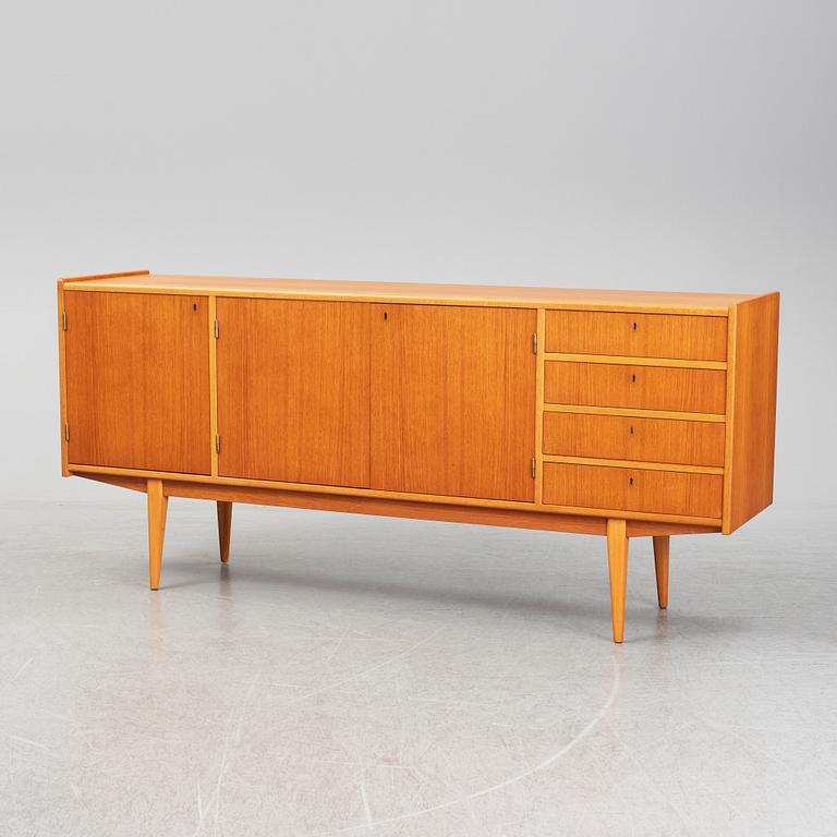 A second half of the 20th century teak veneered sideboard.