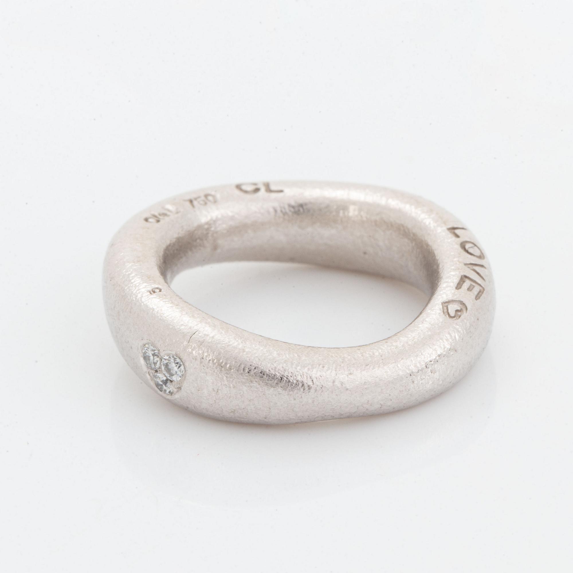 Ole Lynggaard "love ring" with brilliant-cut diamonds.