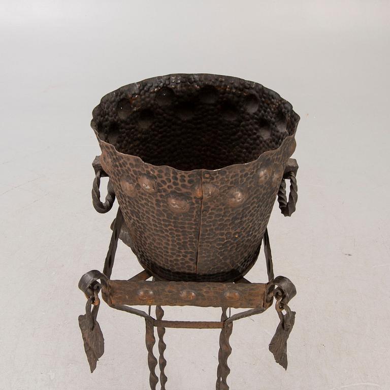 A metal pedestal and urn early 1900s.
