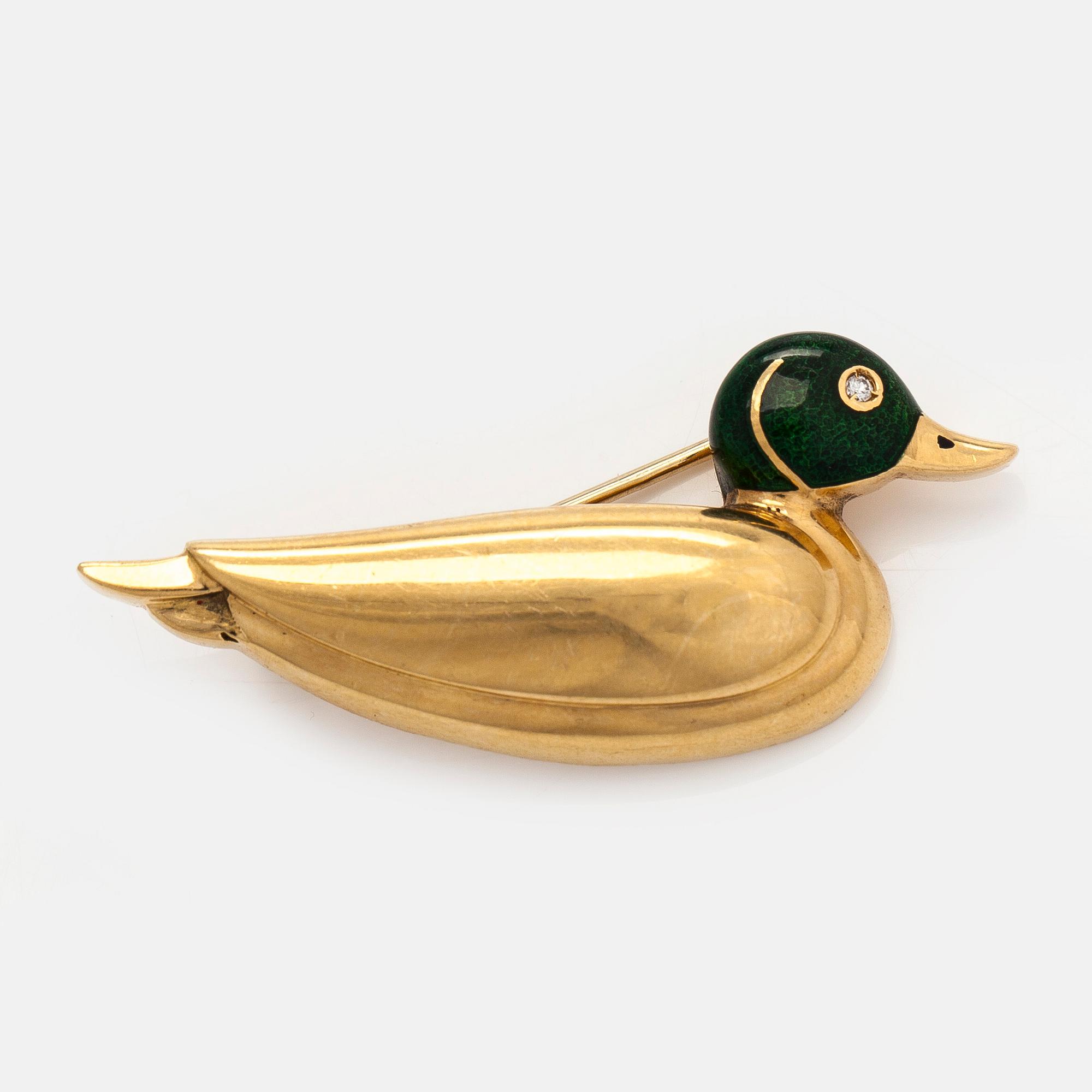 An 18K gold brooch, in the form of a duck, with enamel and a diamond. Switzerland.