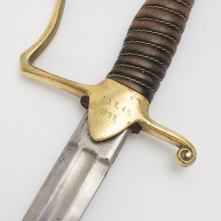 A Swedish artillery sabre 1889 pattern with scabbard.