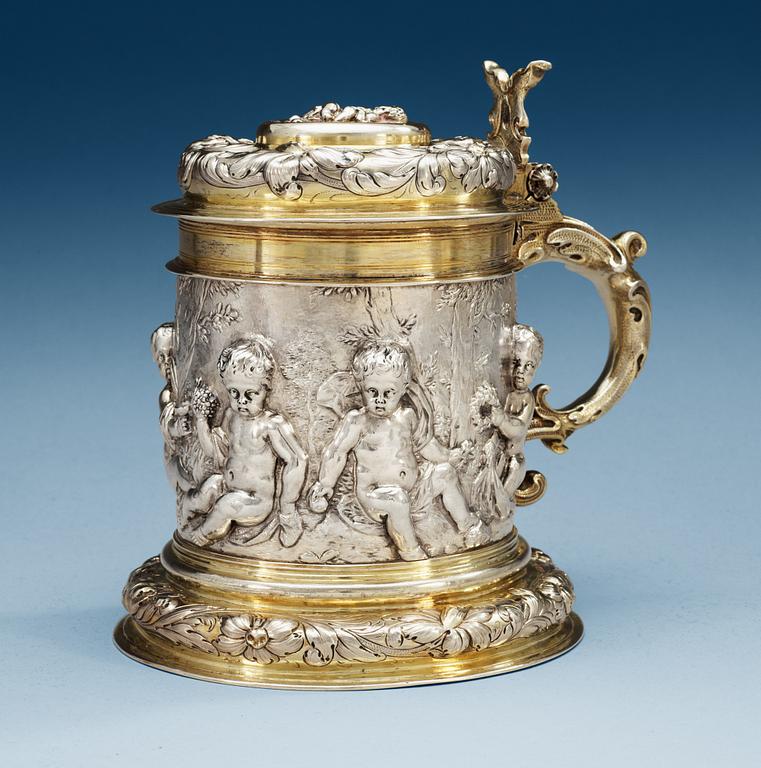 A German 17th century parcel-gilt tankard, makers mark of Johann Brockmer, Hamburg 1662-1685.