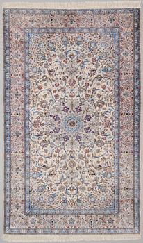 An Isfahan carpet, silk on cotton warp. Circa 269 x 164 cm.