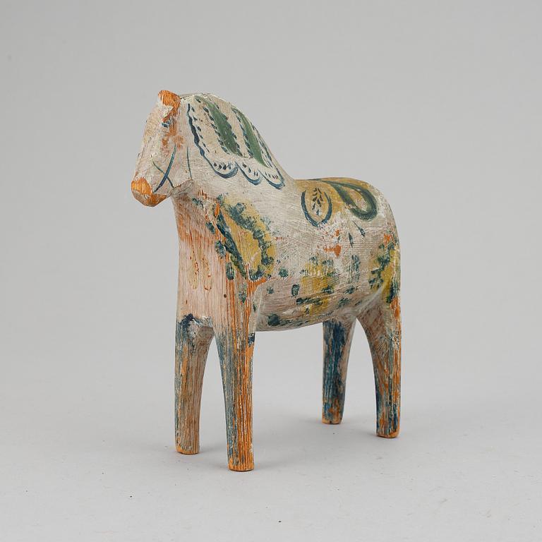 A painted Swedish wooden horse from around year 1900.
