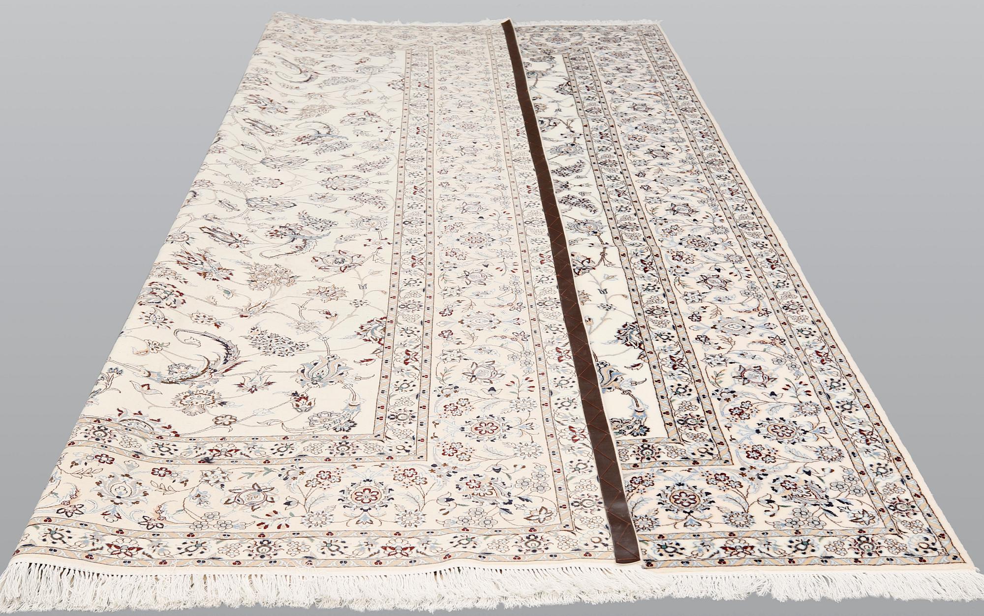 A part silk Nain carpet, so called 6LAA, ca 354 x 250 cm.
