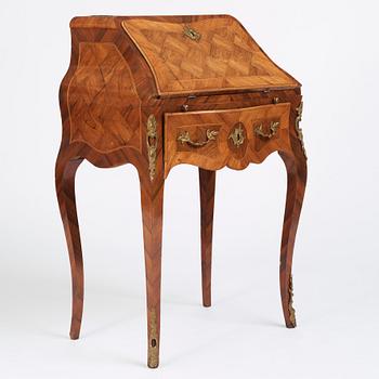 A rococo parquetry secretaire, Stockholm, later part of the 18th century.