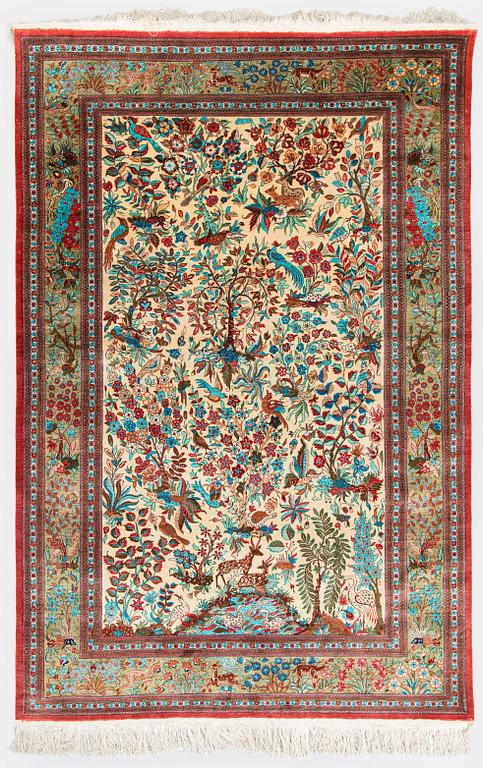 A silk Qum rug, central Persia, c. 210 x 138 cm.