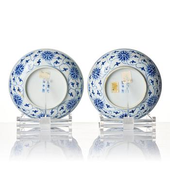 A set of four blue and white 'lotus dishes', Qing dynasty, Tongzhi mark and period (1862-1874).