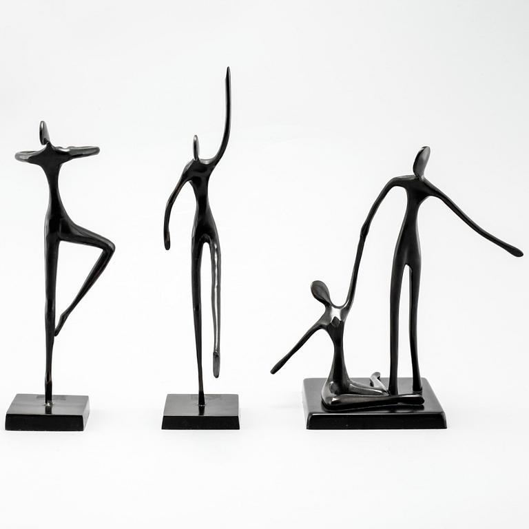 Three patinated bronze sculptures designed by Bodrul Khalique.