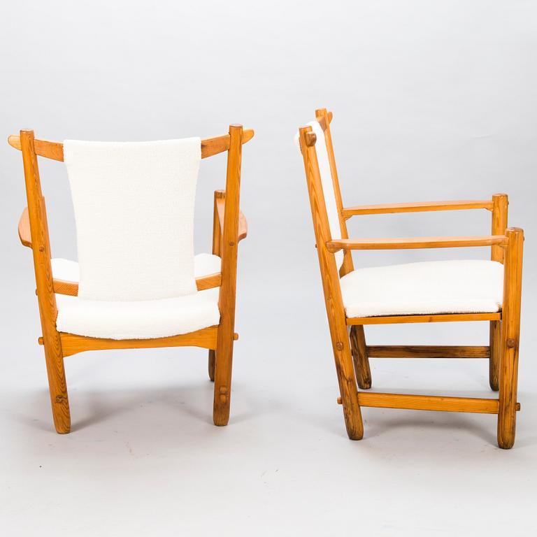 LASSE OLLINKARI, a pair of 1948 open armchairs.