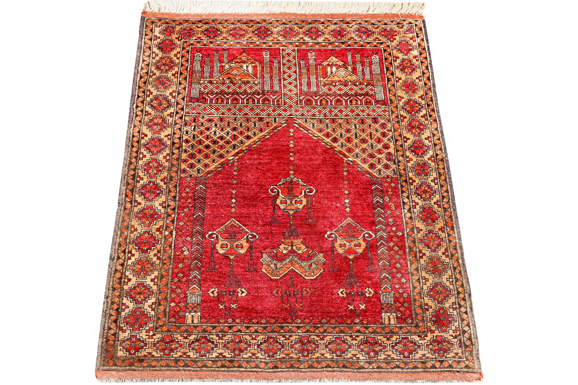 A silk Beluch rug, c. 124 x 81 cm.