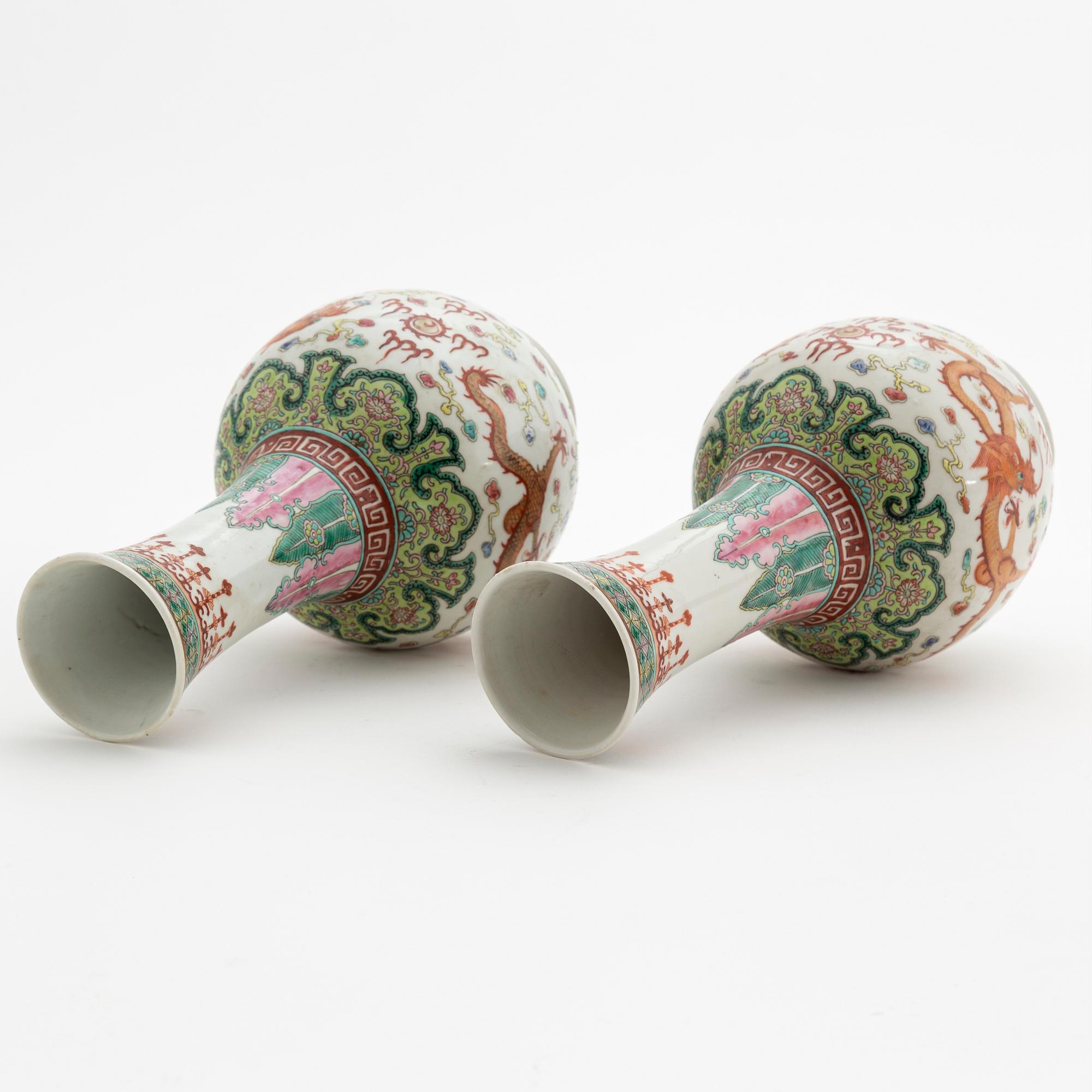 A pair of Chinese porcelain 'dragon' vases, presumably first half of the 20th Century.
