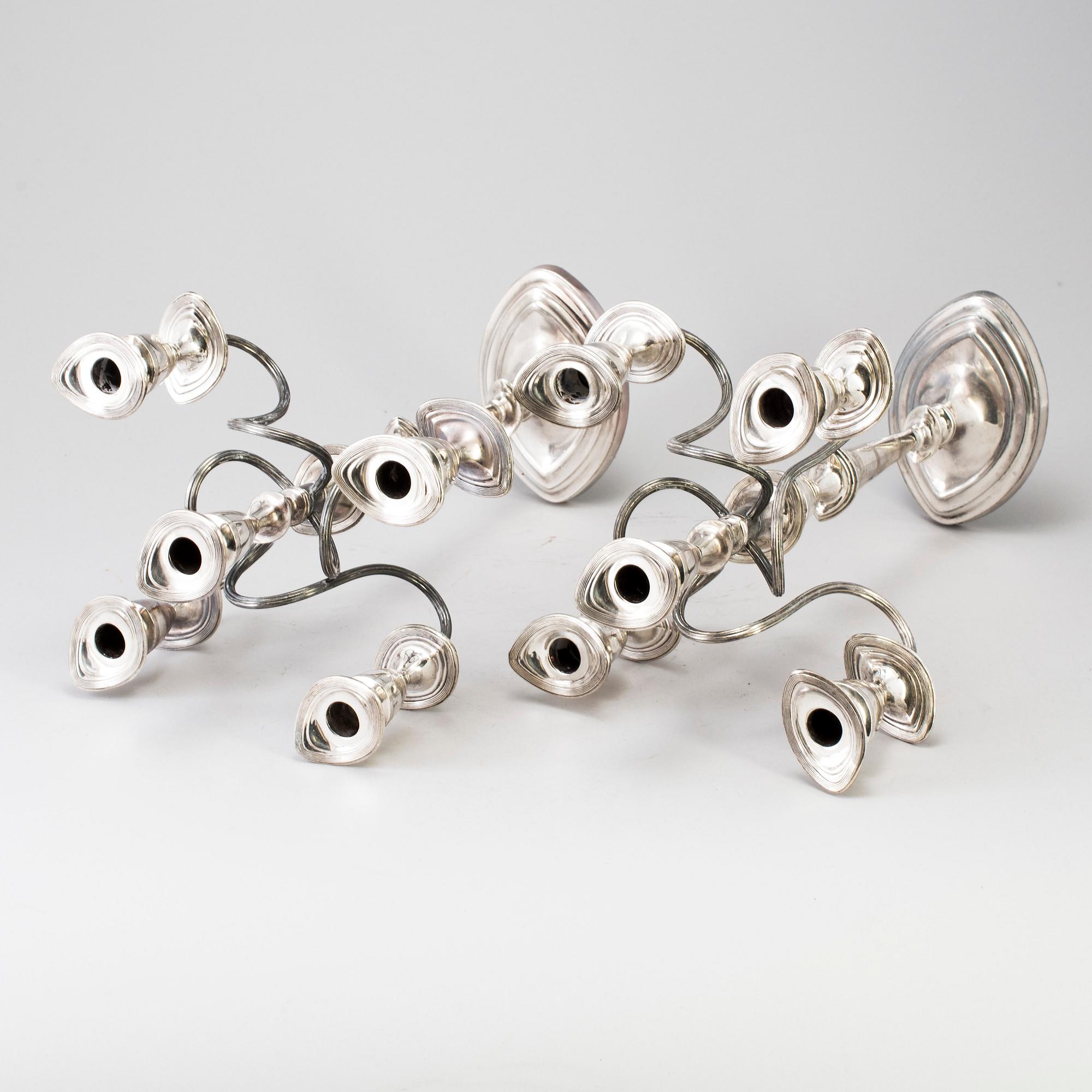 A PAIR OF SILVER PLATE CANDELABRA, regency style, England, first half of the 20th century.
