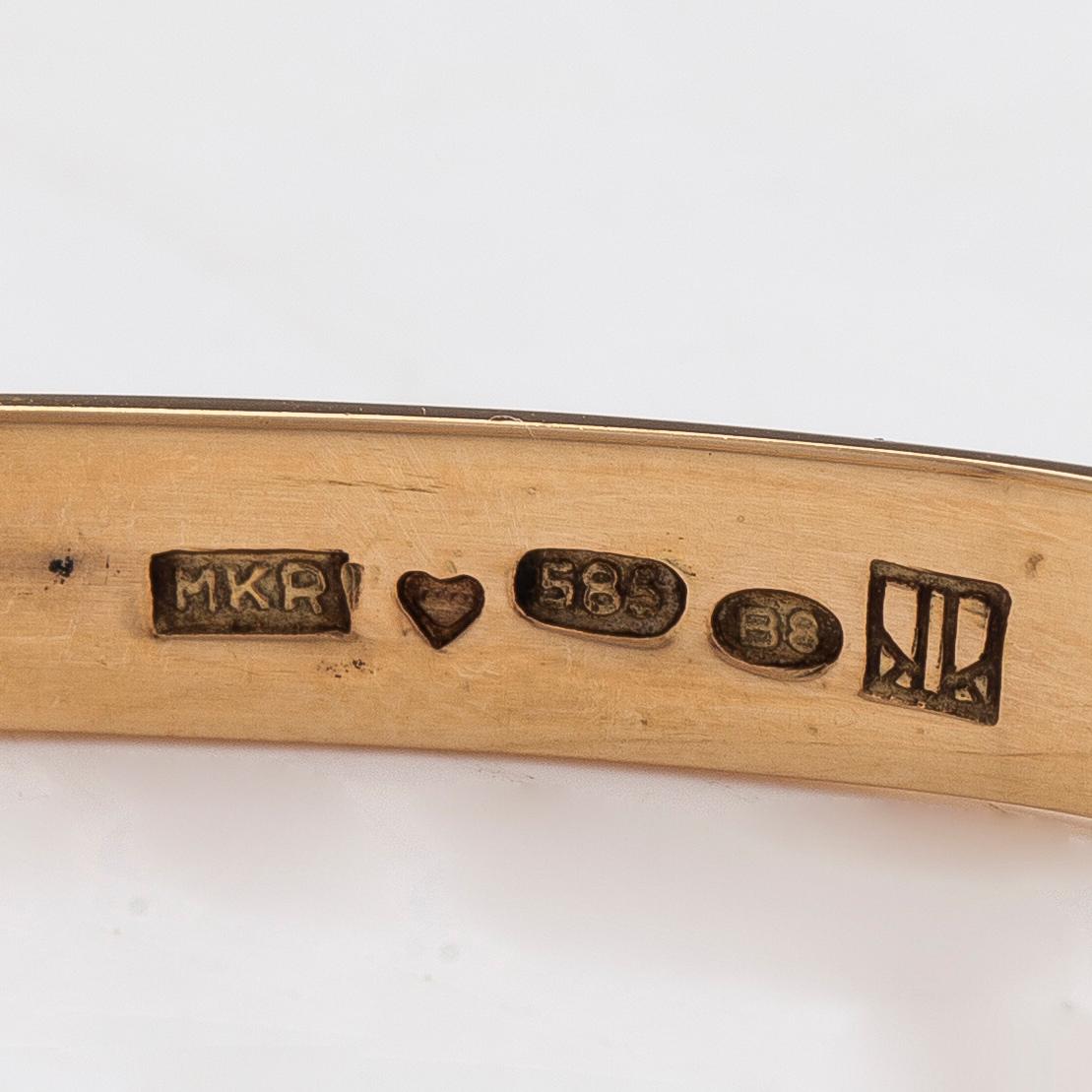 Armring, 14K guld och spektrolit, Kaunis Koru, Helsingfors 1979.