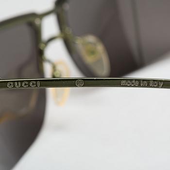 SOLGLASÖGON, Gucci.