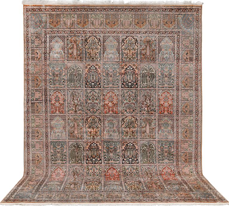 A silk Kashmir carpet, approx. 327 x 243 cm.