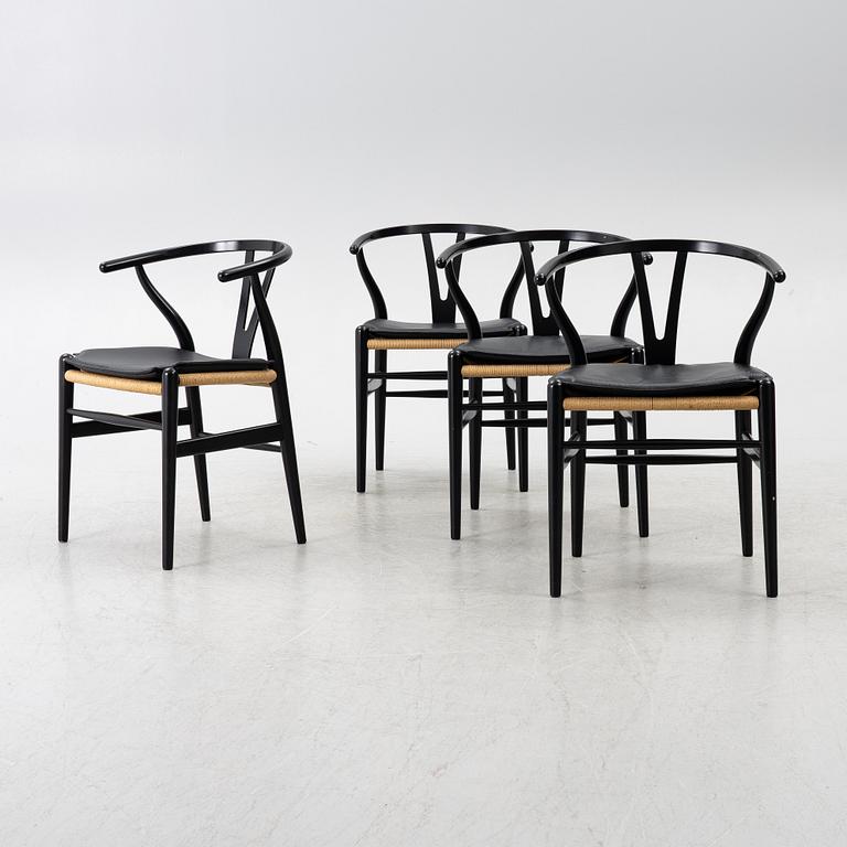 Hans J. Wegner, four CH24/ "Wishbone" chairs, Carl Hansen & Son, Denmark, 21st century.