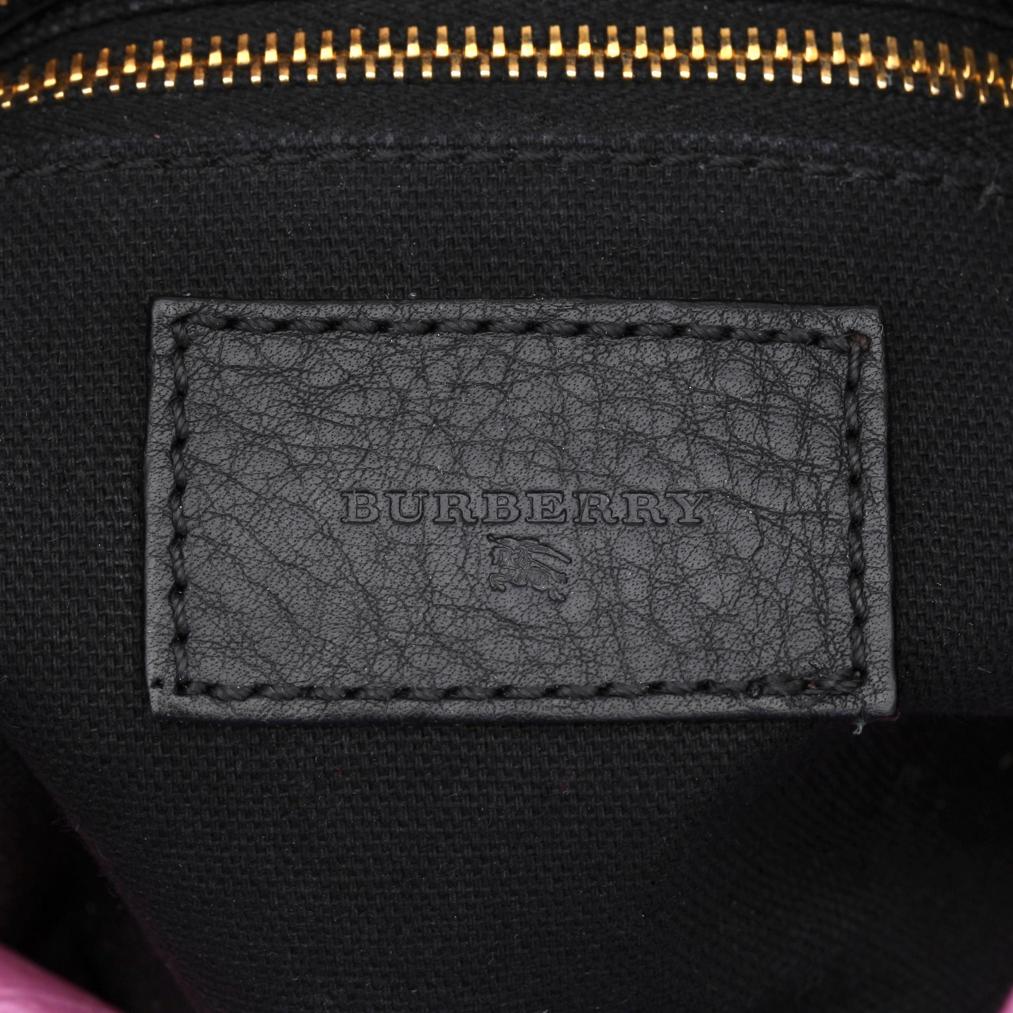BURBERRY, a black leather shoulder bag.