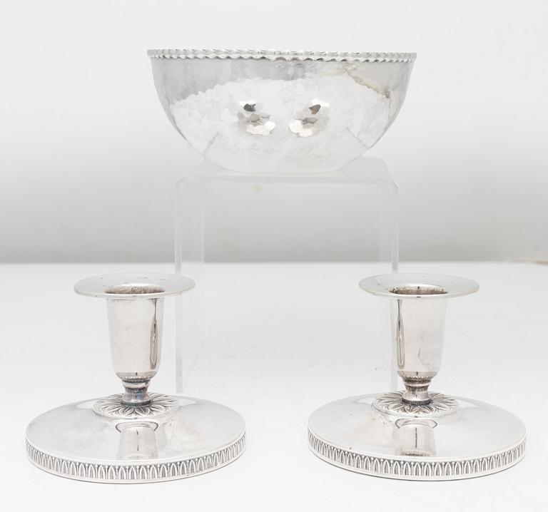 A pair of Swedish silver candlesticks, and a bowl, 1930s–60s.