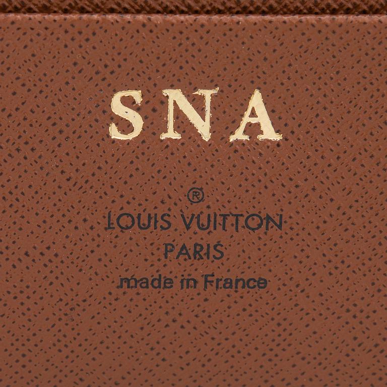 Louis Vuitton, A Monogram 'Large Ring Agenda Cover'.