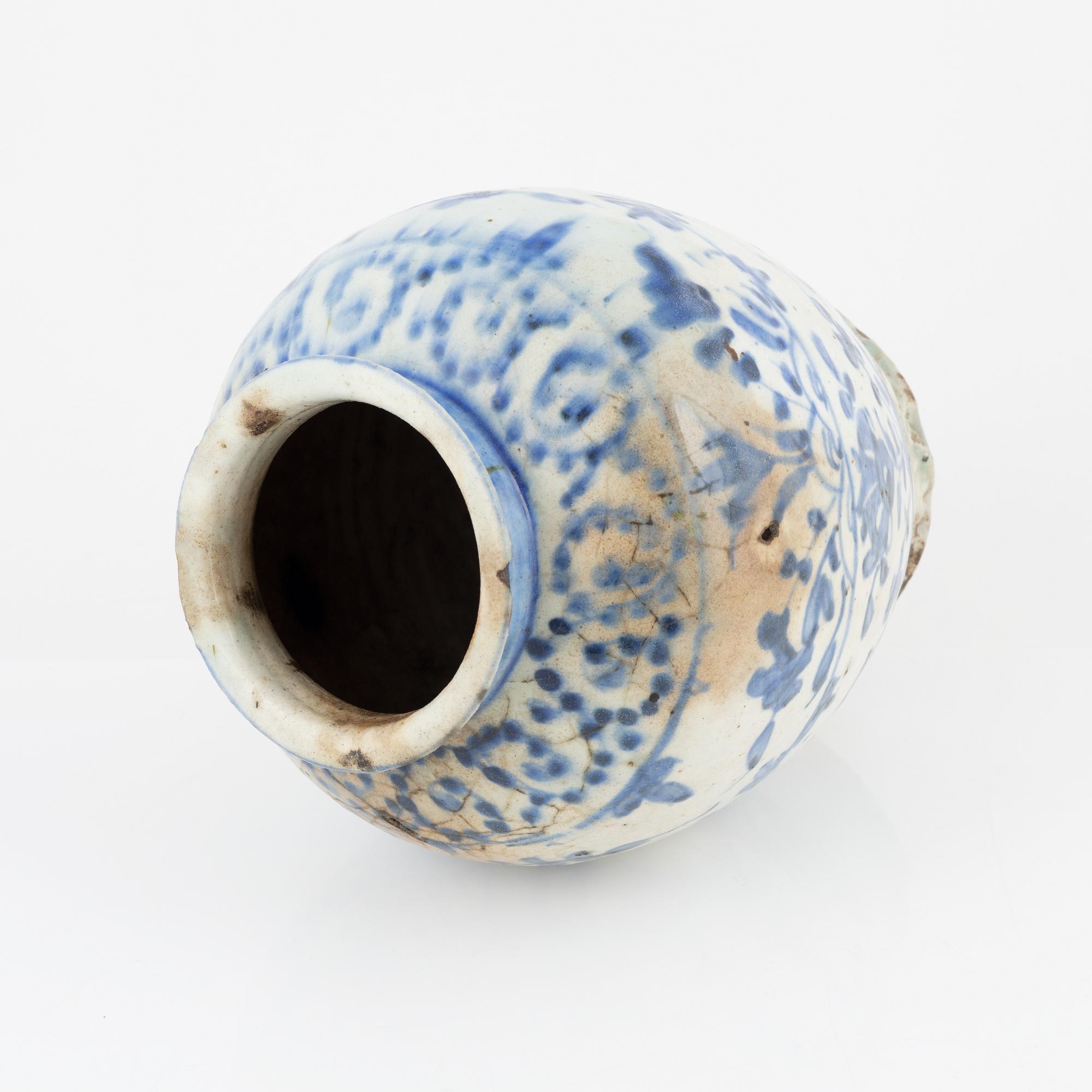 A Persian earthenware vase, Qajar, 19th Century.
