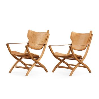 37. A pair of Poul Hundevad oak Egyptian folding chairs, Vamdrup, Denmark 1950-60's.