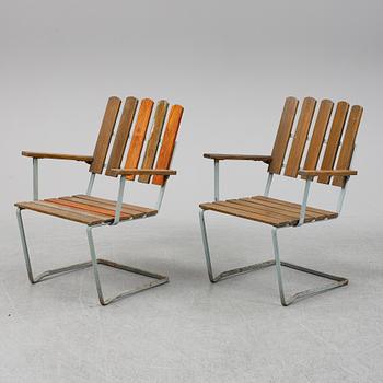 A pair of Grythyttan garden chairs.